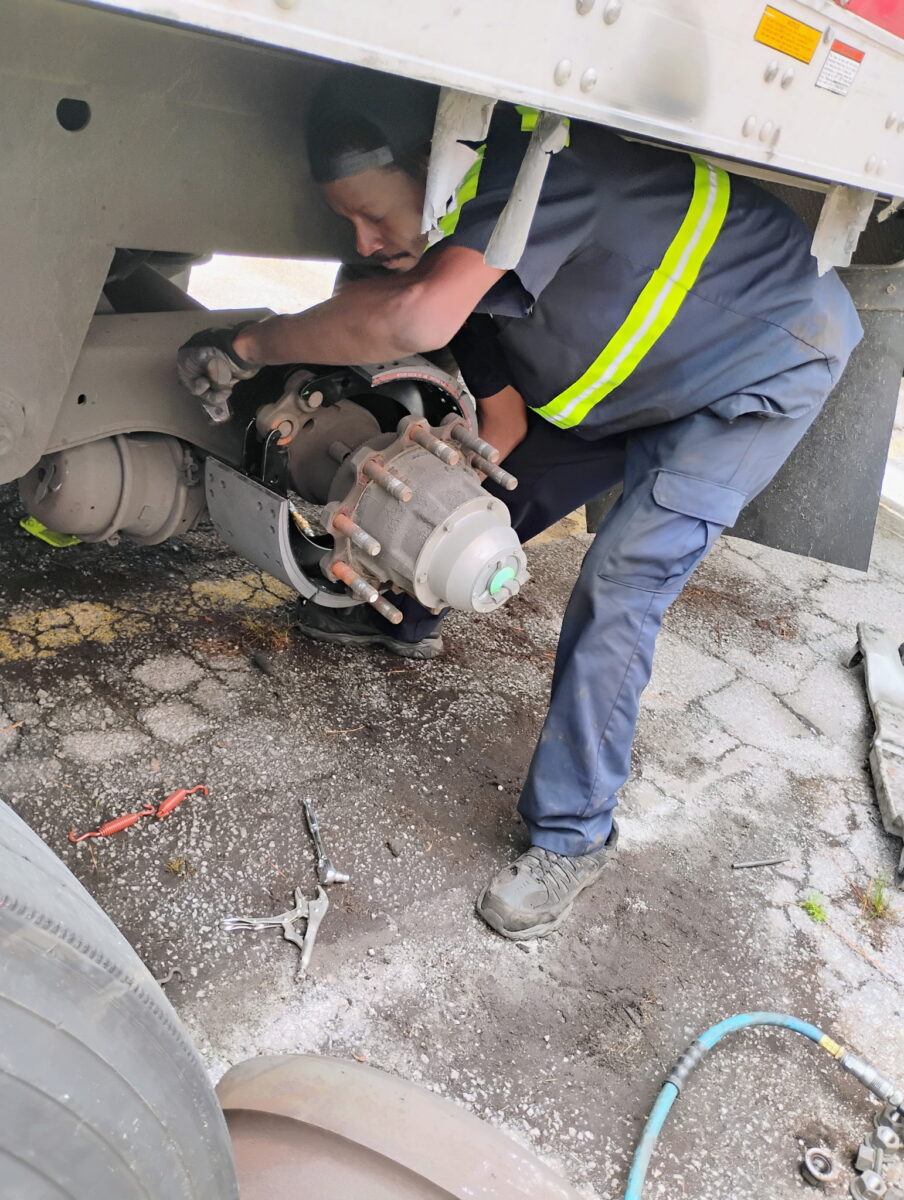 Larry Greasing Landing Gear