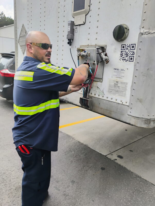 Larry Greasing Landing Gear
