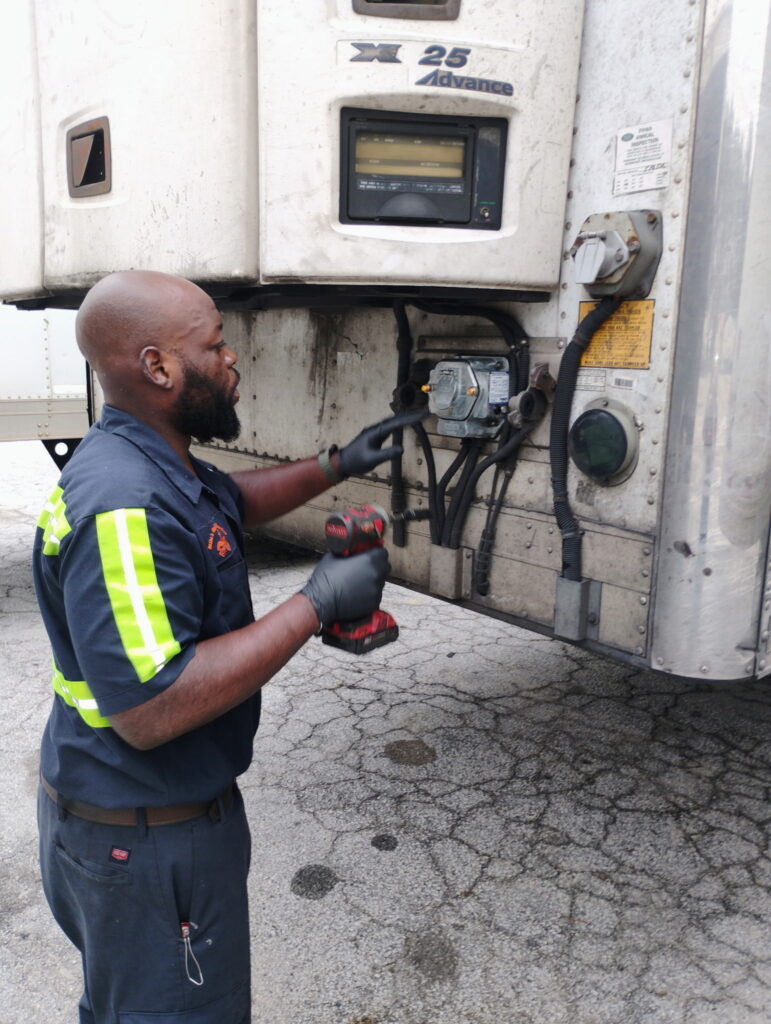 Larry Greasing Landing Gear